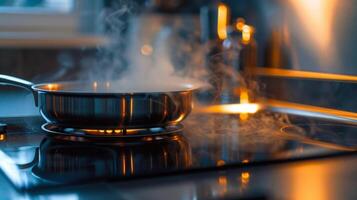 The smooth surface of an induction cooktop with no visible coils or burners creating a clean and modern aesthetic photo