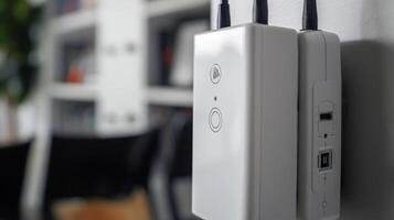 A closeup of the two adjustable antennas on a WiFi range extender perfect for finding the optimal signal strength in any location photo