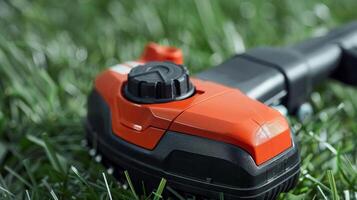 The adjustable handle of the weed whacker with multiple settings for optimal control and comfort photo