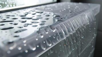 A closeup of the water tank on a portable air conditioner used for collecting condensation and preventing leaks photo