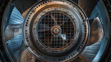 The backside of an exhaust fan revealing a compact and efficient motor mechanism photo