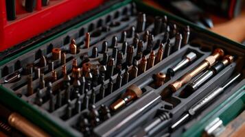 A variety of drill bits rest neatly in the included storage case making it easy to switch between different sizes and types photo