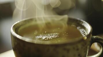 A closeup of a cup of steaming green tea highlighting its theutic properties and use in traditional medicine practices photo