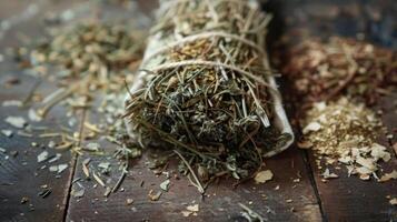 A macro shot of a bundle of dried herbs and es neatly tied together with string representing the natural ingredients mentioned in Ayurvedic medicinal scriptures photo