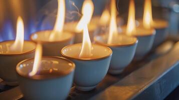 Closeup of a set of fire cups demonstrating the traditional od of cupping where cups are heated with a flame before application photo