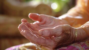 Hands cupped together capturing the essence of Reiki energy and highlighting its ability to tap into ones inner strength for emotional and physical healing photo