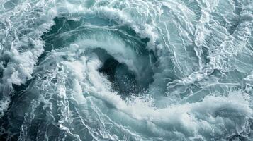 The furious whirlpool creates a symphony of sound the crashing waves and rushing water merging into one photo