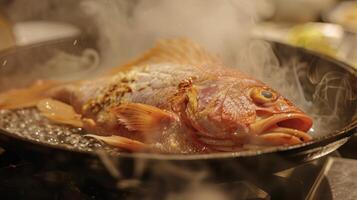 A fish being cooked in a frying pan on a stove, sizzling in hot oil photo