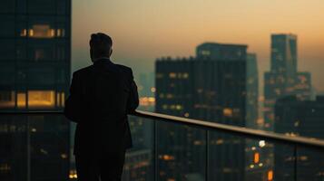 In a rare moment of vulnerability the judge is pictured standing on a balcony overlooking the city lost in thought as they contemplate the gravity of their job and the impact it has photo