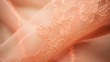 Closeup of a Peach Fuzz lace bralette, featuring a mesh overlay and dainty lace trim for a feminine touch. photo