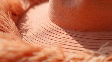 Closeup of a Peach Fuzz floppy hat, providing both style and sun protection for a day at the beach. photo