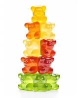 Embrace the chewy goodness of these flavorful gummy bears, blessed with a slightly tangy twist that makes each chew more addictive than the last. photo