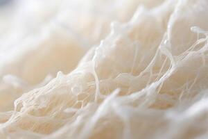 Sugarinfused webs A masterful creation formed by skillfully intertwining strands of sugar, resulting in an airy weblike treat that seduces the senses with its delicate sweetness and photo
