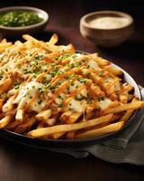 Satisfy your cravings with these cheese fries that showcase a harmonious blend of crispy, seasoned fries that provide the perfect crunch, complemented by a melty cheese topping that oozes photo