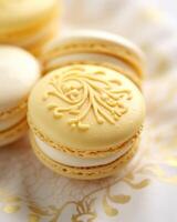 In this closeup shot, a single macaron steals the spotlight with its impeccable presentation. Its pale yellow shell boasts a beautiful pattern of intricate swirls and a light dusting of photo