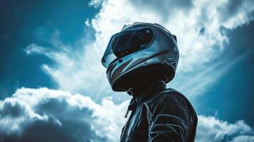 Helmeted Hero A dramatic portrait of the racer wearing their fullface helmet, looking upwards towards the sky as if envisioning their next victory. photo