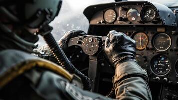 The fighter pilots hand clenched on the joystick, emphasizing the precision and control needed for aerial combat. photo