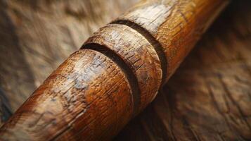 The rough grain of the wooden bat closeup and focused photo