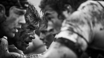 The grit and determination on the faces of players as they dig deep in the scrum photo