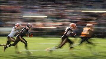 The players jerseys blur as they run across the field giving their all for their team and fans photo
