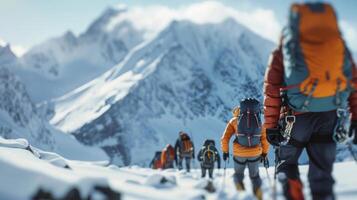 A group of mountaineers make way up a snowy mountain backs turned to the camera as they conquer the challenging terrain . photo
