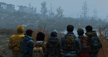 A group of survivors huddle together backs facing the camera as they look towards the horizon. The ruins behind them serve as a reminder . photo