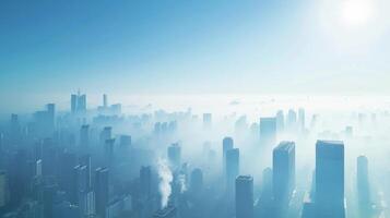 A city skyline is shown with a clear blue sky above it thanks to the use of clean renewable energy sources. In contrast another city is visible with a thick layer of smog hanging over photo