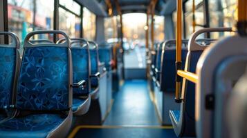 A closeup shot of the inside of a biofuelpowered city bus with rows of comfortable seats and clean spacious aisles. The windows allow natural light to flood in creating a pleasant photo