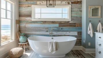 The bathroom in the Nautical Beach House is a peaceful oasis with a calming color palette of soft grays and aqua blue. The highlight of the space is a statement wall made of reclaimed photo