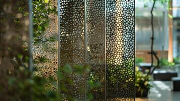The perforated metal sheets are not just functional as room dividers but also serve as unique pieces of artwork. The intricate patterns and precise perforations are visually striking photo