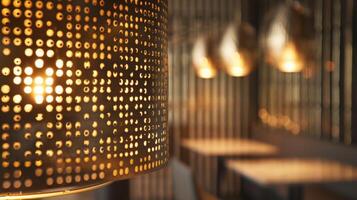 The metal perforated lampshade gleamed in the ambient light adding a touch of modern elegance to the room. The play of light through the intricate perforations created a mesmerizing photo