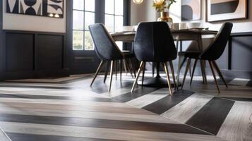 A modern dining room showcasing the versatility of LVT with a mix of black and white geometric tiles and a woodlook plank in a herringbone pattern. The bold contrast of colors and photo