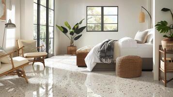 As you enter the bedroom you are greeted by the luxurious feel of a traditional terrazzo floor blended with the clean lines and simplicity of modern decor. The neutral tones of the photo