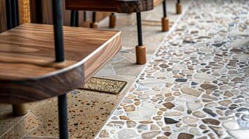 Integrated into the floor design are small plaques that proudly declare the use of sustainable materials in the creation of the terrazzo. This added touch serves as a gentle reminder photo