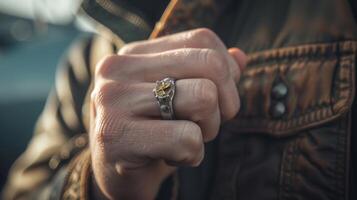 Finally a closeup of a pilots grasped hand shows off a stunning ring with a propeller design. A simple yet powerful tribute to their love of flying it serves as a constant reminder photo
