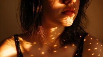 Sunspots sprinkle her shoulders and chest resembling a tering of tiny golden coins. photo