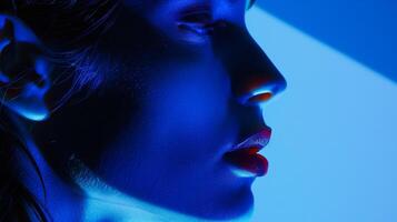 Underneath the harsh fluorescents of a dressing room the shadows create a striking contrast against the porcelain skin adding a touch of drama. photo