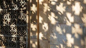 The shadows of a lattice window create an intricate geometric pattern on the skin adding a touch of sophistication. photo