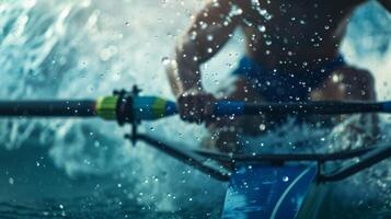 The defined back muscles of a rower as they powerfully move their oars through the water. photo