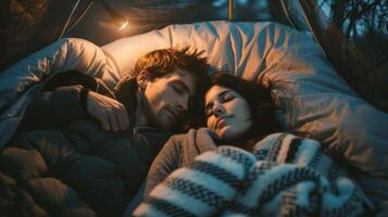 A couple sleeping in a tent their bodies entwined and their faces peaceful. The sounds of nature and the intimacy of their shared space create a sense of serenity and tranquility as photo