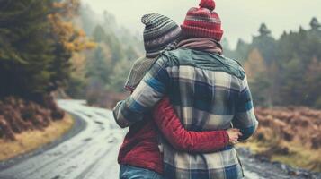 Arms linked together casually hugging each other as they walk side by side sharing a moment of love. photo