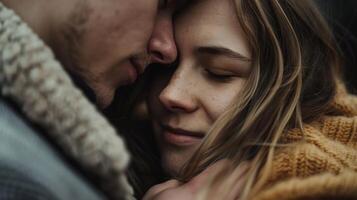 A hug between two lovers their foreheads pressed together in a moment of shared intimacy and comfort. photo