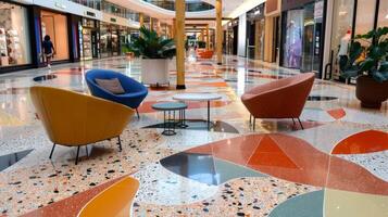 In a bustling shopping mall a central seating area is surrounded by a vibrant and eyecatching terrazzo floor. The floor features a bold and colorful mix of terrazzo chips giving the photo
