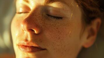 The meditators facial expression is serene and focused as if she is truly in tune with her inner self photo
