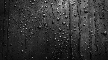 Droplets of condensation slowly sliding down the smooth surface of the cooler evidence of its cooling capabilities photo