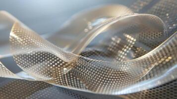 A detailed shot of a piezoelectric sheet showcasing its flexibility and ability to bend and conform to different shapes photo