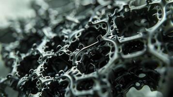 An extreme closeup of a small intricate device made entirely out of magnetic shape memory polymers. It appears to be a complex mechanism with numerous moving parts yet i photo