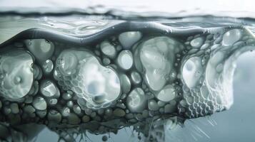 A macro shot of a 3D printed object being submerged in water. The tingedge material used in its creation is completely waterresistant opening up a world of possibilities fo photo
