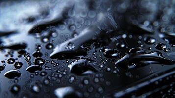 A magnified view of a hydrophobic coating on a smartphone screen making it resistant to water and sweat and allowing us to use our devices in various weather conditions photo