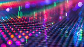 A closeup shot of a computer screen with a grid of brightly lit pixels. The description explains that these are quantum dots in action allowing for vibrant and accurate color photo